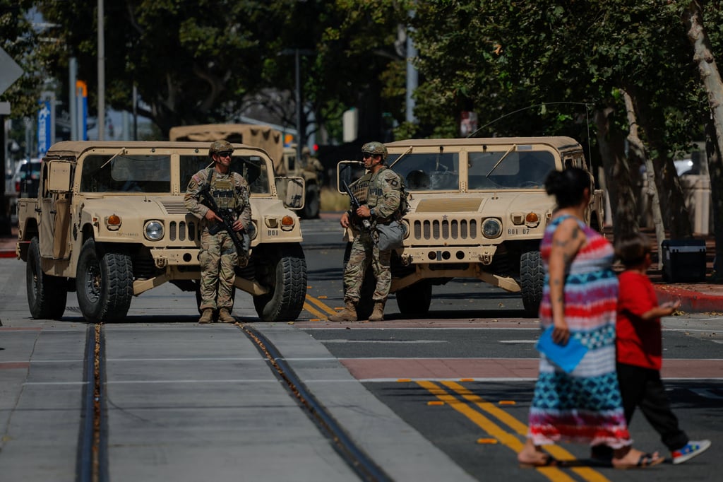 National Guard troops outside a complex of federal buildings in Santa Ana, California. Photo: Reuters National Guard troops outside a complex of federal buildings in Santa Ana, California. Photo: Reuters