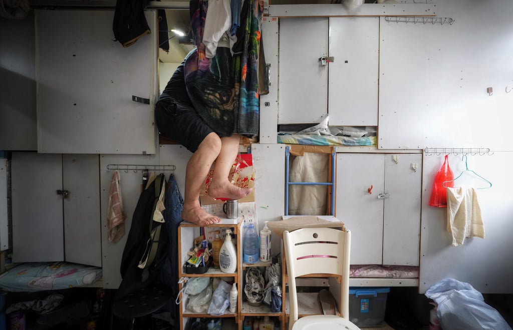 The number of subdivided flats which failed to comply with size requirements stood at 28,600 out of 110,000, according to official figures released late last year. Photo: Elson Li The number of subdivided flats which failed to comply with size requirements stood at 28,600 out of 110,000, according to official figures released late last year. Photo: Elson Li