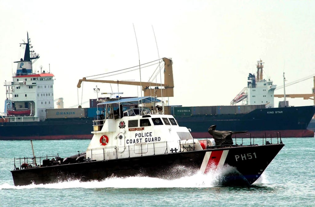 A Singapore Police Coast Guard boat patrols around the Eastern Anchorage off the island nation. Photo: AFP A Singapore Police Coast Guard boat patrols around the Eastern Anchorage off the island nation. Photo: AFP