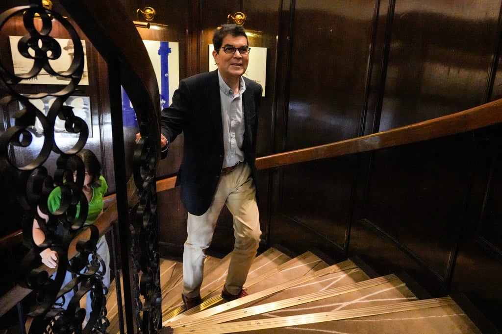 David Webb arrives at the Foreign Correspondents’ Club in Hong Kong for a farewell fireside chat last month. Photo: May Tse