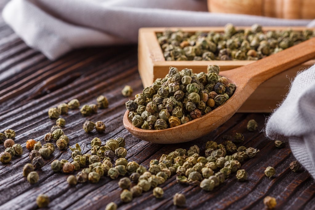 Green peppercorns are the unripe fruit of the Piper nigrum vine. Photo: Shutterstock Green peppercorns are the unripe fruit of the Piper nigrum vine. Photo: Shutterstock