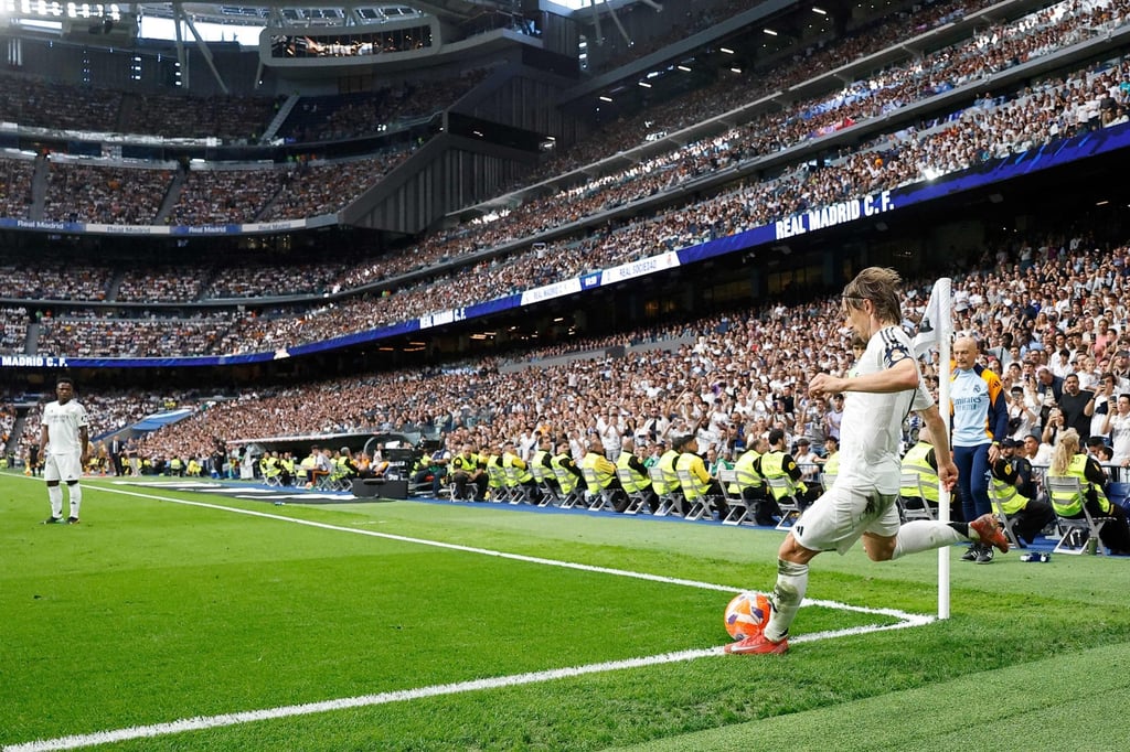 Real Madrid’s Luka Modric takes a corner at the club’s Bernabeu Stadium. Photo: AFP Real Madrid’s Luka Modric takes a corner at the club’s Bernabeu Stadium. Photo: AFP