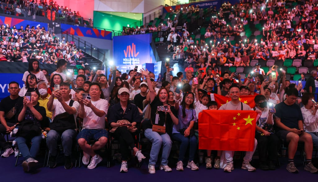 China fans cheer on their team against Japan in the Women’s Volleyball Nations League clash at Kai Tak Arena. Photo: Edmond So