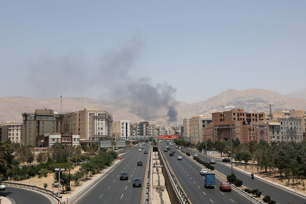 Smoke rises following what Iran says was an Israeli attack on Sharan Oil depot in Tehran, Iran, on Monday. Photo: Reuters Smoke rises following what Iran says was an Israeli attack on Sharan Oil depot in Tehran, Iran, on Monday. Photo: Reuters