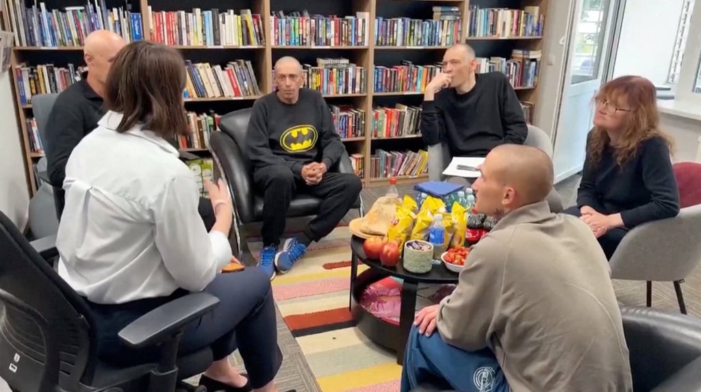 Belarus opposition leader Syarhei Tsikhanouski and his wife Sviatlana Tsikhanouskaya speak with released prisoners in Vilnius, Lithuania. Photo: Sviatlana Tsikhanouskaya via X