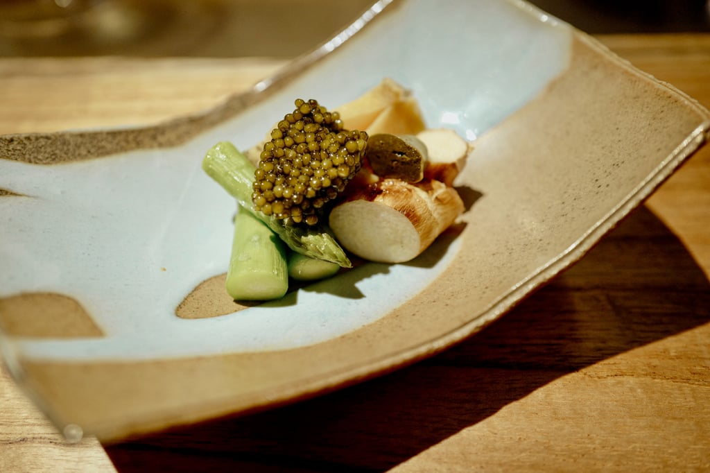 A dish of abalone, asparagus, bamboo and caviar at Eika. Photo: Mavis Teo