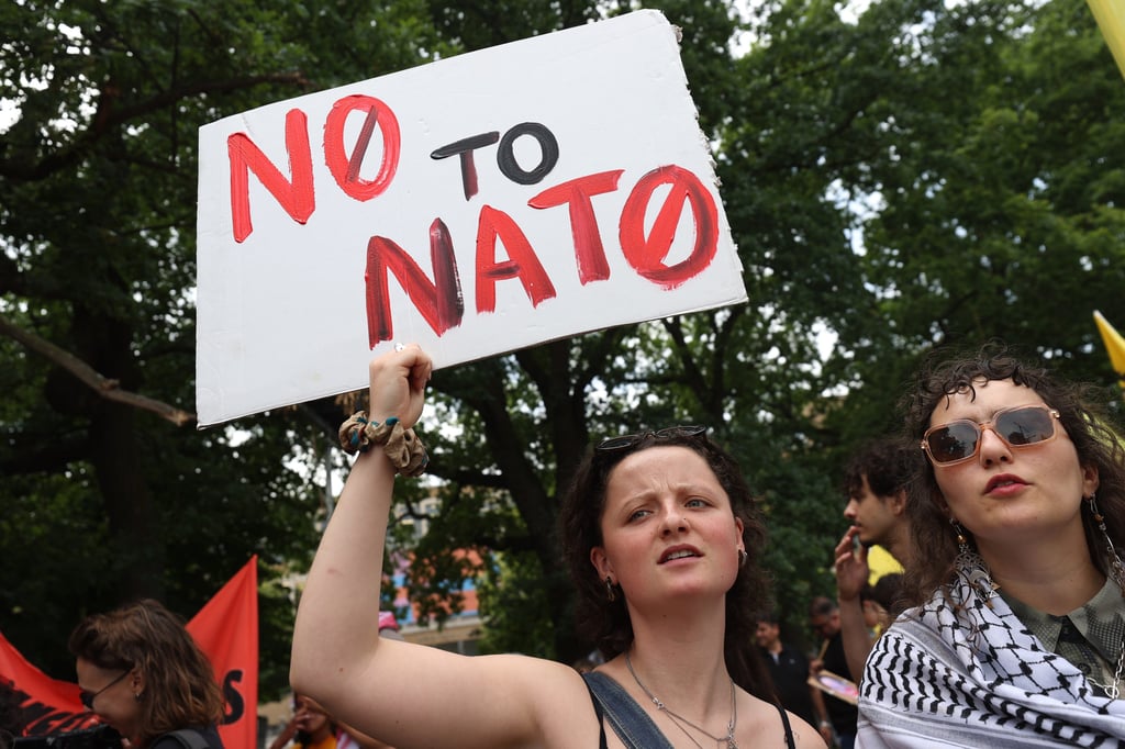 Anti-Nato protesters rally in The Hague on Sunday before this week’s summit. Photo: Xinhua Anti-Nato protesters rally in The Hague on Sunday before this week’s summit. Photo: Xinhua