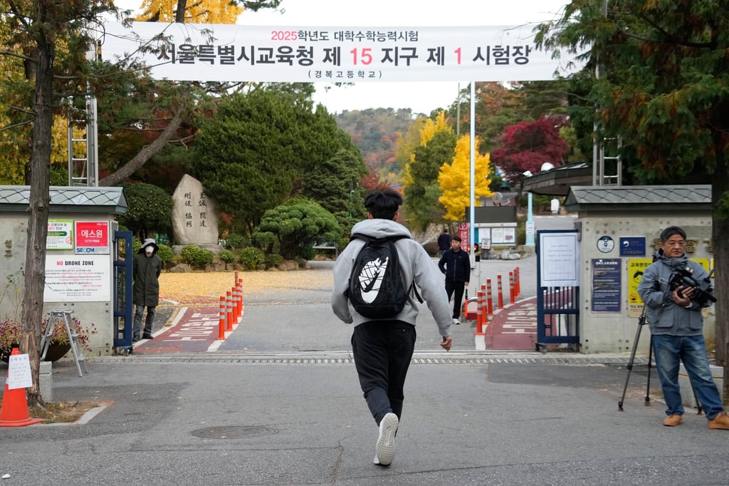 A student runs to take a university entrance exam in Seoul last year. The death of three teenage girls has sparked calls for education reforms in South Korea. Photo: AP A student runs to take a university entrance exam in Seoul last year. The death of three teenage girls has sparked calls for education reforms in South Korea. Photo: AP