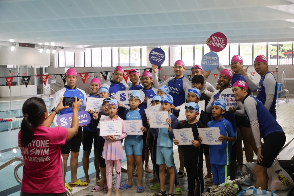 Children and instructors pose for a photograph during the course. Photo: Edmond So