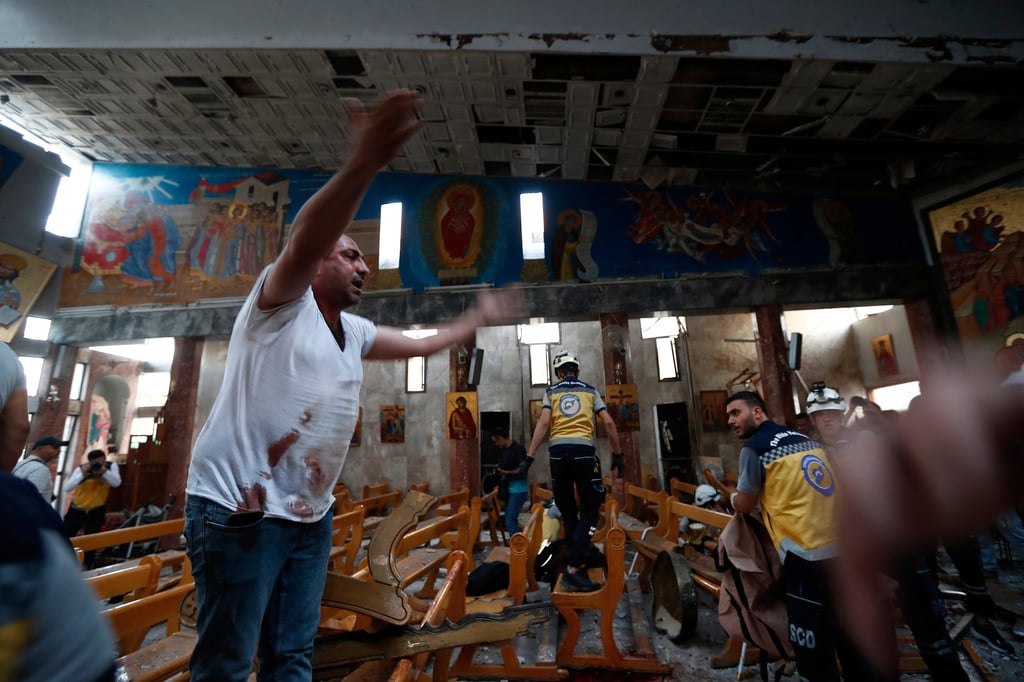 Inside the church after the bombing. Photo: AP Inside the church after the bombing. Photo: AP