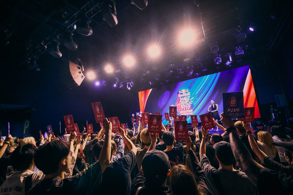 A crowd of students and dancers cast their votes towards their supported contestants during the Hong Kong Red Bull Dance Your Style 2025 university qualifier. Photo: LEWIMAGE A crowd of students and dancers cast their votes towards their supported contestants during the Hong Kong Red Bull Dance Your Style 2025 university qualifier. Photo: LEWIMAGE