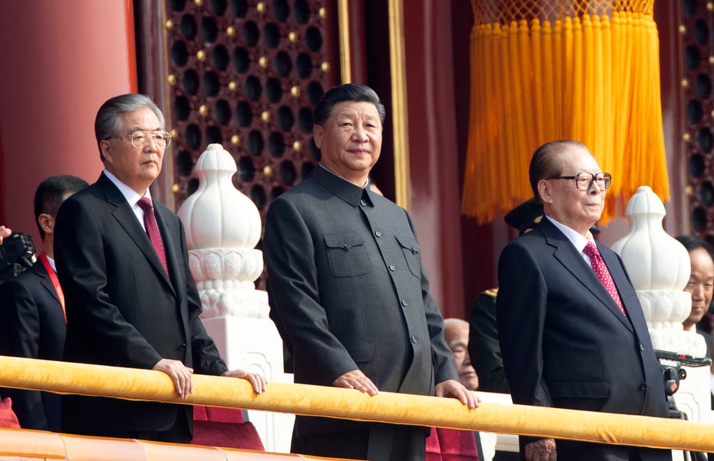 Xi Jinping (centre) with former presidents Hu Jintao (left) and Jiang Zemin at the 2019 parade. Photo: AP Xi Jinping (centre) with former presidents Hu Jintao (left) and Jiang Zemin at the 2019 parade. Photo: AP