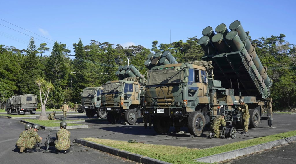 Japanese soldiers deploy Type-88 surface-to-ship short-range missiles as part of joint military drills with the US last year. Photo: Kyodo / AP Japanese soldiers deploy Type-88 surface-to-ship short-range missiles as part of joint military drills with the US last year. Photo: Kyodo / AP