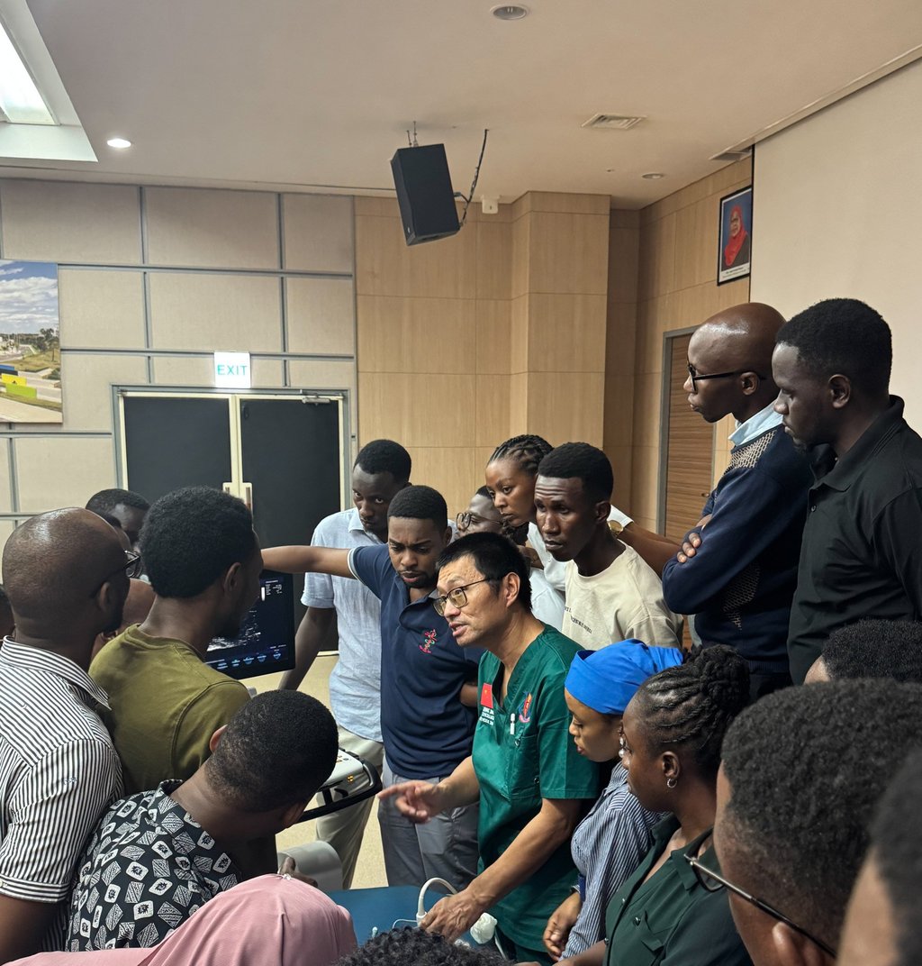 Zhang Junqiao with local medical students at Muhimbili National Hospital in Dar es Salaam, Tanzania, in May. Photo: Xinhua Zhang Junqiao with local medical students at Muhimbili National Hospital in Dar es Salaam, Tanzania, in May. Photo: Xinhua