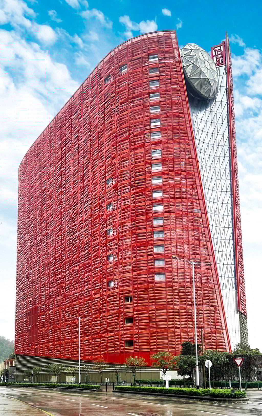 The striking red facade of The 13 Hotel. Photo: Handout The striking red facade of The 13 Hotel. Photo: Handout