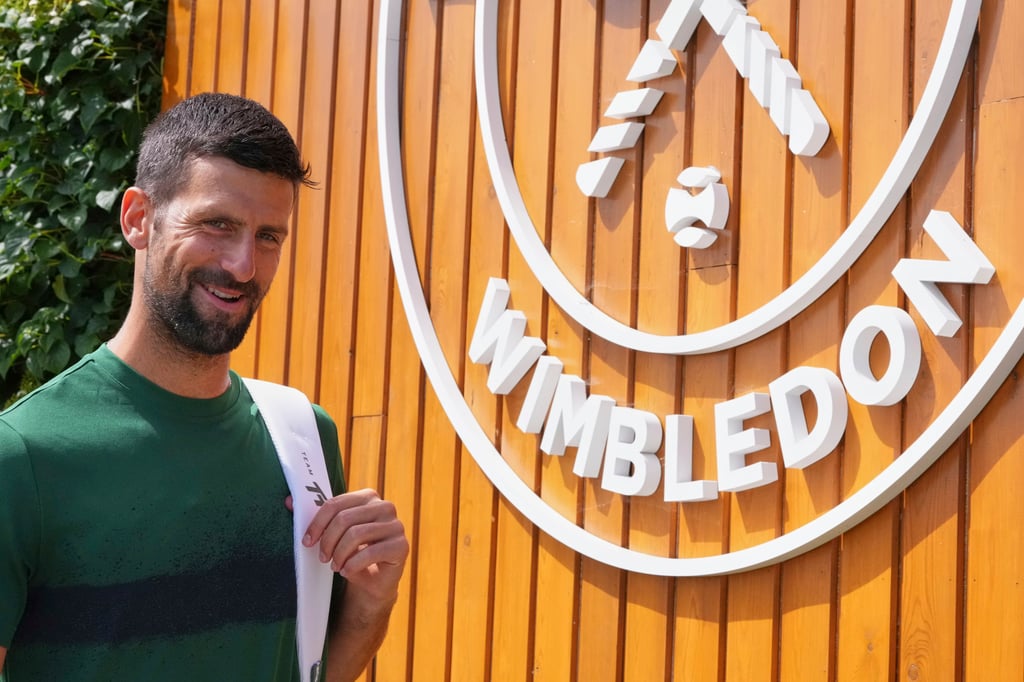 Novak Djokovic arrives for practice at the All England Lawn Tennis and Croquet Club. Photo: AP