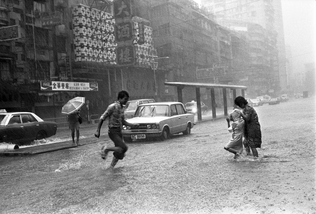 Torrential rains dumped by the severe tropical storm Mac flood King’s Road on Hong Kong Island in September 1979. Photo: SCMP Archives