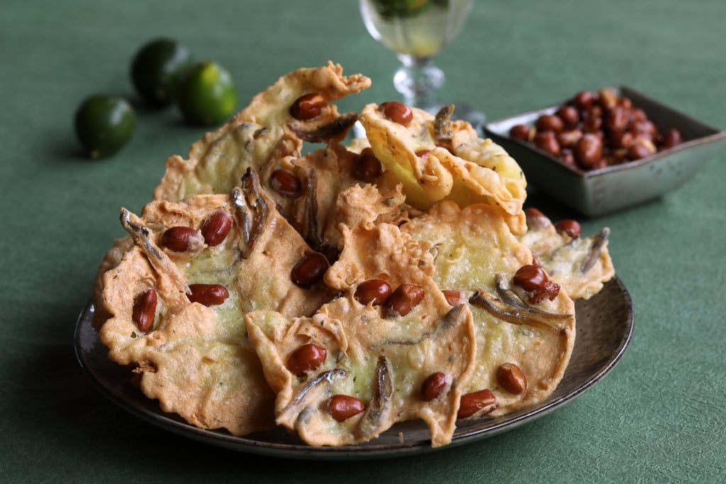 Curry leaves add a wonderful fragrance to this rempeyek with peanuts and ikan bilis dish. Photo: Jonathan Wong Curry leaves add a wonderful fragrance to this rempeyek with peanuts and ikan bilis dish. Photo: Jonathan Wong