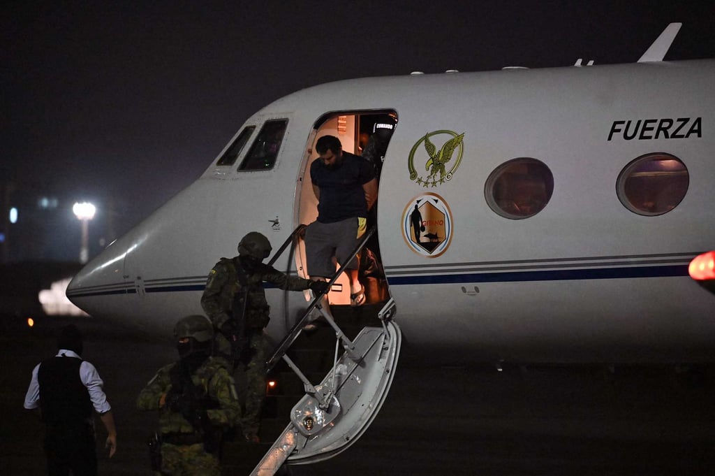 Jose Adolfo Macias Villamar arriving at an airbase in Guayaquil, Ecuador. Photo: AFP Jose Adolfo Macias Villamar arriving at an airbase in Guayaquil, Ecuador. Photo: AFP