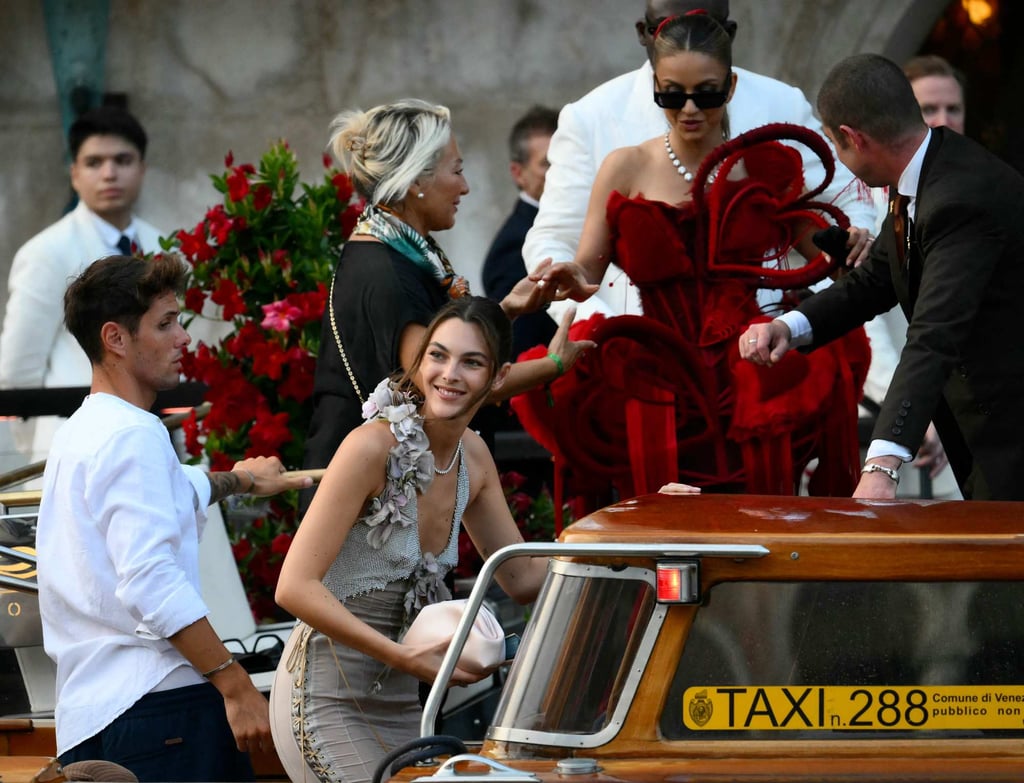 Vittoria Ceretti and Natasha Poonawalla leaving Venice’s Gritti Palace hotel on June 26. Photo: AFP