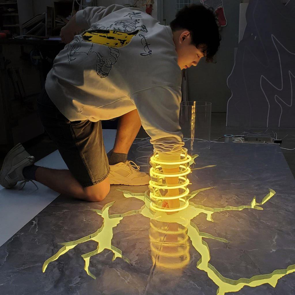 Artist Jerry Loo with the Superhero Landing sculpture featuring at the PMQ exhibition in Hong Kong’s Central district. Photo: Neon Heroes Artist Jerry Loo with the Superhero Landing sculpture featuring at the PMQ exhibition in Hong Kong’s Central district. Photo: Neon Heroes