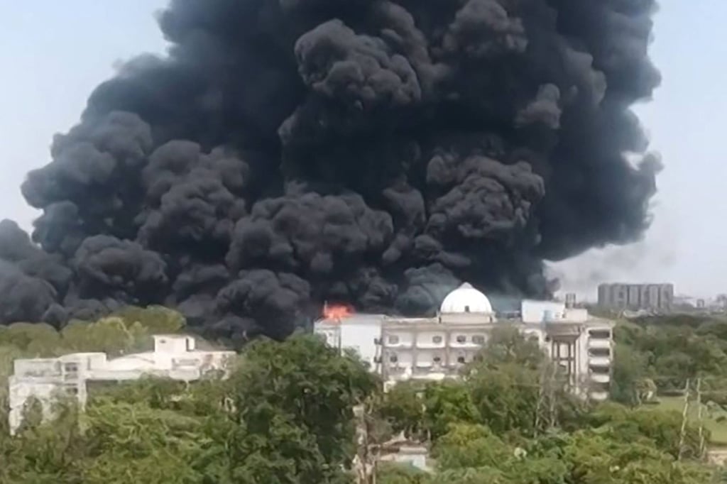 A screengrab from video footage shows smoke rising from a residential area after Air India flight 171 crashed in Ahmedabad on June 12. Photo: AFP A screengrab from video footage shows smoke rising from a residential area after Air India flight 171 crashed in Ahmedabad on June 12. Photo: AFP