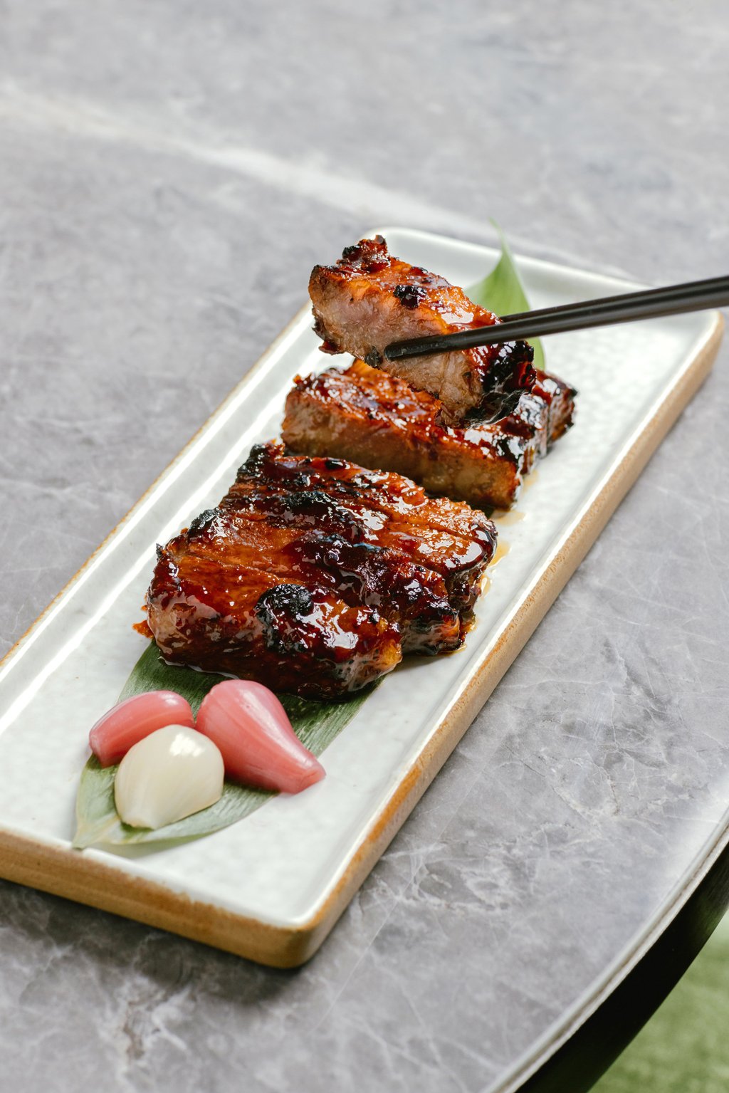 Chinesology’s roasted beef with 20 years tangerine peel, honey and peanut – a halal-friendly spin on char siu pork. Photo: Nicholas Wong Chinesology’s roasted beef with 20 years tangerine peel, honey and peanut – a halal-friendly spin on char siu pork. Photo: Nicholas Wong