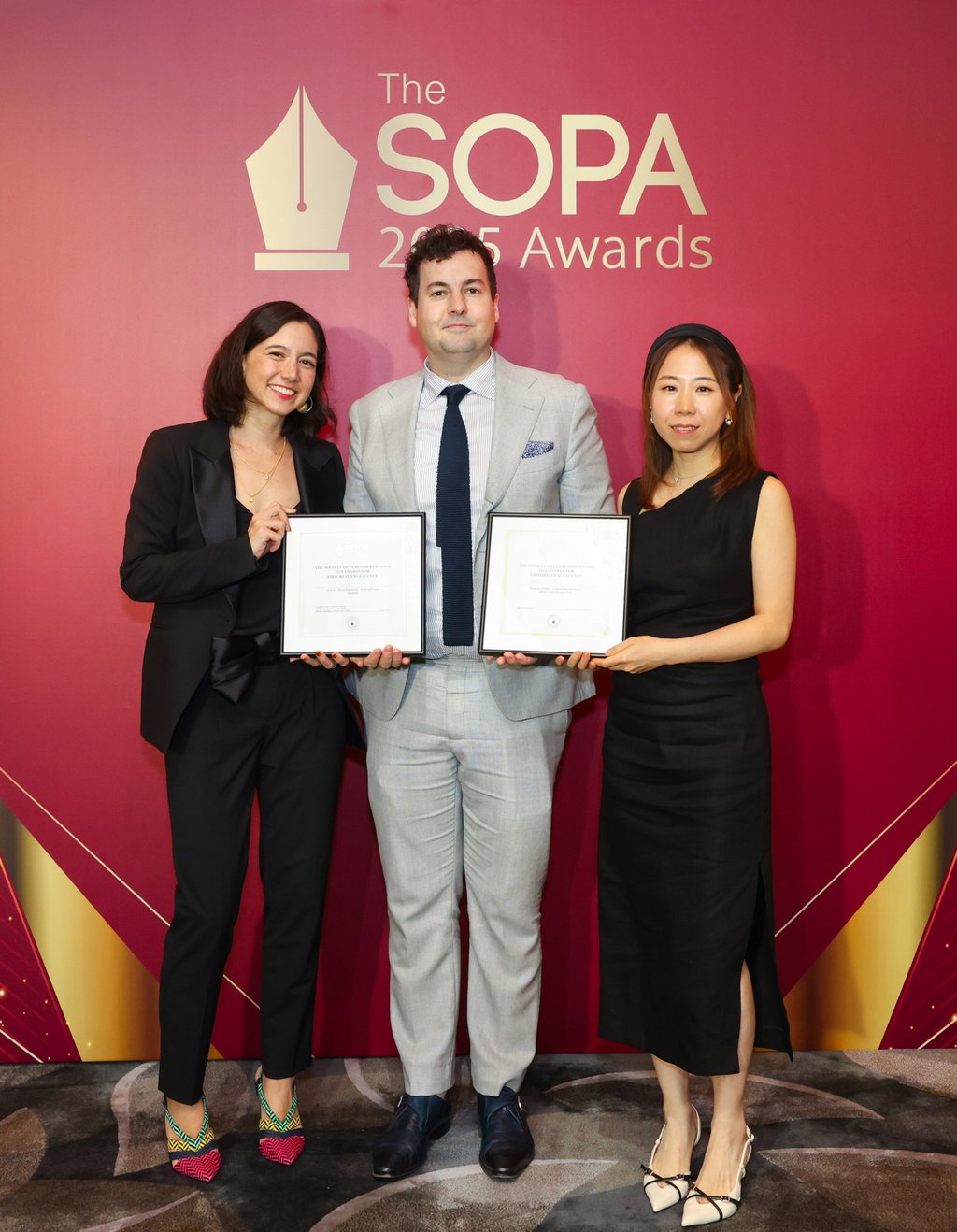 From left: Cat Nelson, editor of PostMag; Lee Williamson, executive director of SCMP’s specialist publications; and Naomi Chan, lead designer of PostMag, with the awards after the prize-giving ceremony. Photo: SOPA From left: Cat Nelson, editor of PostMag; Lee Williamson, executive director of SCMP’s specialist publications; and Naomi Chan, lead designer of PostMag, with the awards after the prize-giving ceremony. Photo: SOPA