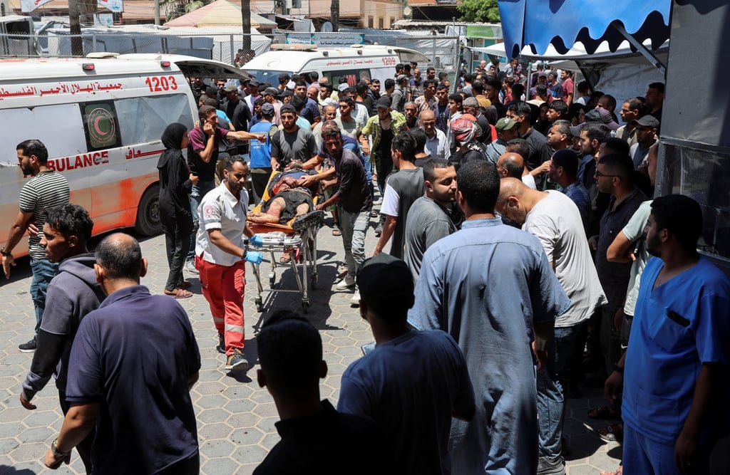 A Palestinian casualty is brought to Al-Aqsa Martyrs Hospital. Photo: Reuters A Palestinian casualty is brought to Al-Aqsa Martyrs Hospital. Photo: Reuters