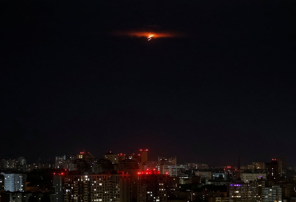 An explosion lights up the sky over Kyiv on Sunday. Photo: Reuters An explosion lights up the sky over Kyiv on Sunday. Photo: Reuters