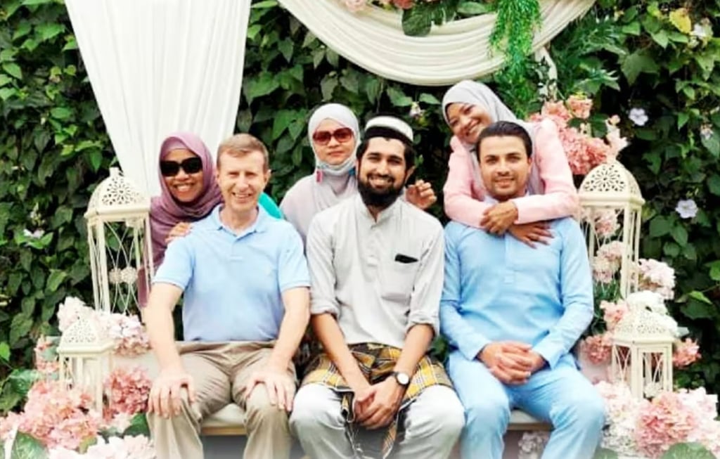 The trio of husbands from Britain, Pakistan and Egypt with their Malaysian wives. Photo: handout The trio of husbands from Britain, Pakistan and Egypt with their Malaysian wives. Photo: handout