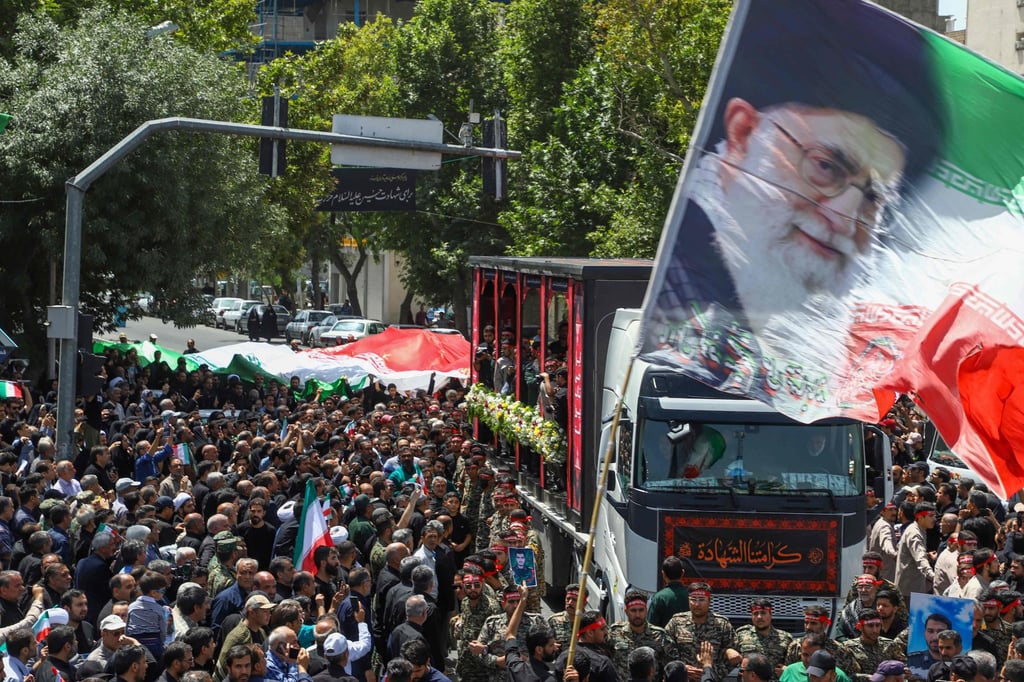 A funeral procession in Tehran for military commanders and nuclear scientists killed during the 12-day conflict with Israel. Photo: AFP A funeral procession in Tehran for military commanders and nuclear scientists killed during the 12-day conflict with Israel. Photo: AFP