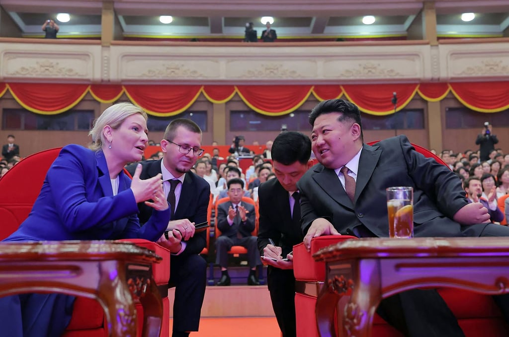 North Korean leader Kim Jong-un speaks to Russian Minister of Culture Olga Lyubimova (left) at the event in East Pyongyang Grand Theatre. Photo: KCNA via KNS / AFP North Korean leader Kim Jong-un speaks to Russian Minister of Culture Olga Lyubimova (left) at the event in East Pyongyang Grand Theatre. Photo: KCNA via KNS / AFP