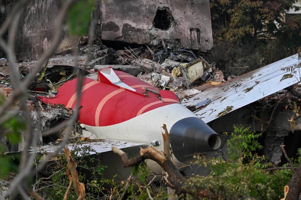 Wreckage showing the tail section of the Air India Boeing 787-8 is pictured in a residential area near the airport in Ahmedabad on June 14. Photo: AP Wreckage showing the tail section of the Air India Boeing 787-8 is pictured in a residential area near the airport in Ahmedabad on June 14. Photo: AP
