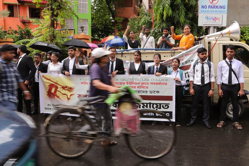 Law students shout slogans during a protest march in Kolkata on Monday after a 24-year-old law student was allegedly raped on the campus of South Calcutta Law College on June 25. Photo: EPA