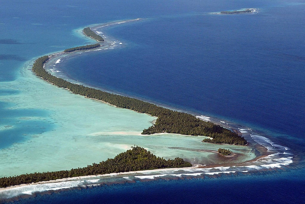 The serpentine coastline of Funafuti Atoll, home to nearly half of Tuvalu’s entire population. Photo: AFP The serpentine coastline of Funafuti Atoll, home to nearly half of Tuvalu’s entire population. Photo: AFP