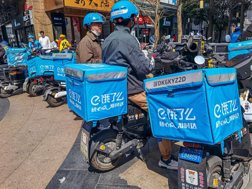 Ele.me food delivery riders in Beijing. Photo: Shutterstock Images