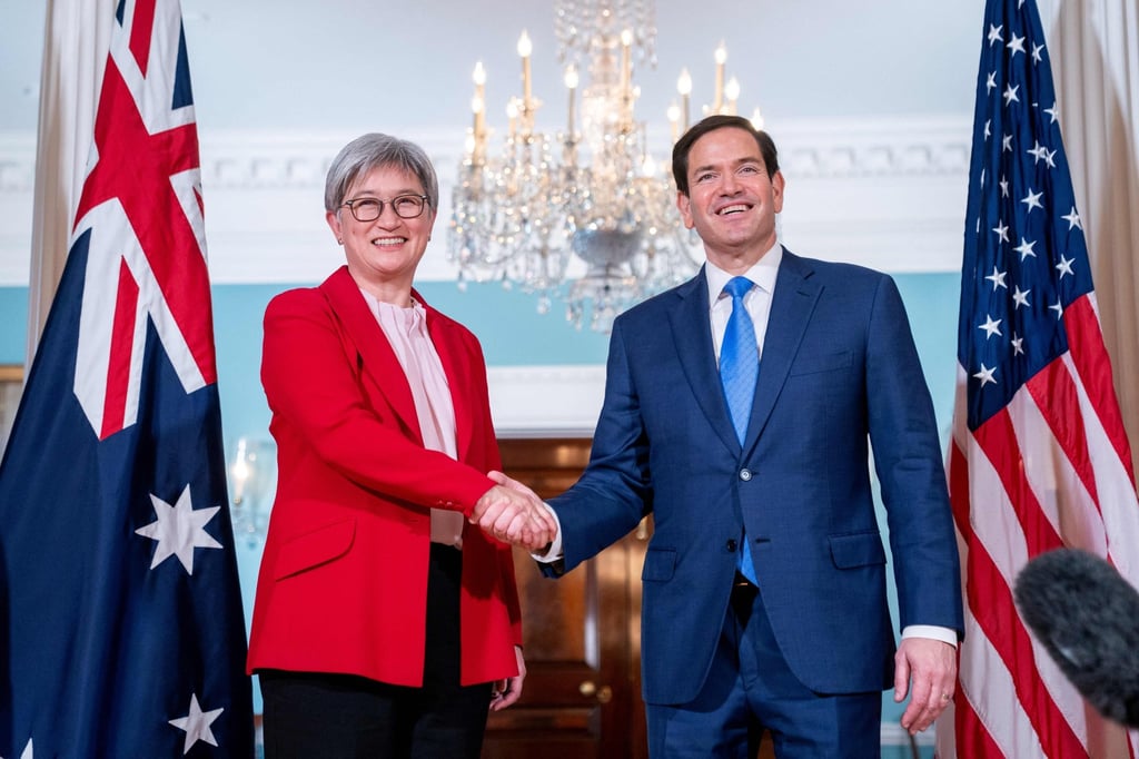Rubio shakes hands with Wong on Tuesday. Photo: AFP