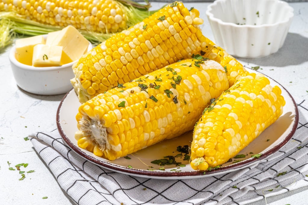 Boiled sweetcorn rubbed with a bit of butter is a classic dish. Photo: Shutterstock