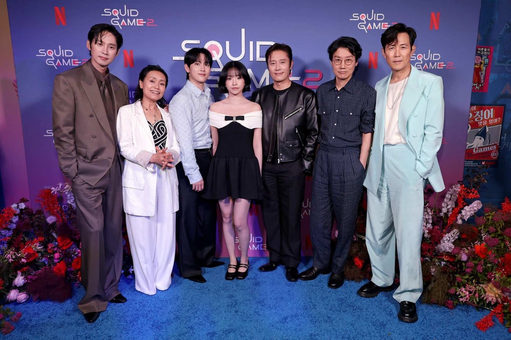 Park Sung-hoon, Kang Ae-shim, Yim Si-wan, Jo Yu-ri, Lee Byung-hun, Hwang Dong-hyuk and Lee Jung-jae attend Netflix’s Squid Game Experience at Manhattan Mall on June 17, in New York City. Photo: Getty Images