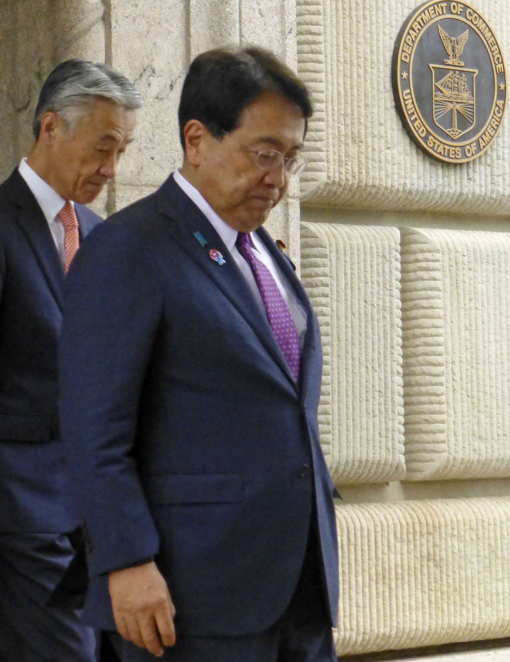 Japan’s chief tariff negotiator Ryosei Akazawa (right) leaves the US Department of Commerce in Washington after holding talks with US Commerce Secretary Howard Lutnick on June 27. Photo: Kyodo Japan’s chief tariff negotiator Ryosei Akazawa (right) leaves the US Department of Commerce in Washington after holding talks with US Commerce Secretary Howard Lutnick on June 27. Photo: Kyodo