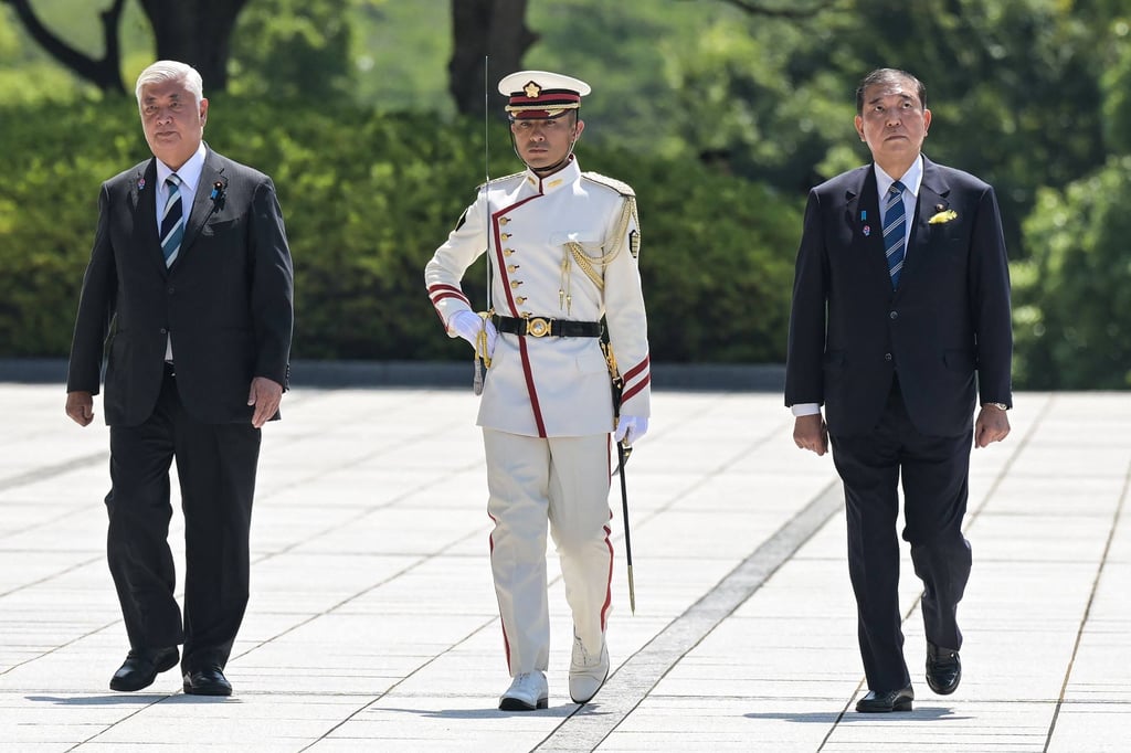 Japan’s Defence Minister Gen Nakatani (left) and Prime Minister Shigeru Ishiba (right) after inspecting an honour guard at the Ministry of Defence in Tokyo on June 30. Photo: AFP Japan’s Defence Minister Gen Nakatani (left) and Prime Minister Shigeru Ishiba (right) after inspecting an honour guard at the Ministry of Defence in Tokyo on June 30. Photo: AFP