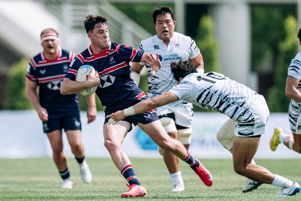 Paul Altier works his way through the South Korea defence. Photo: HKCR