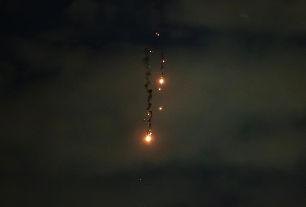 An exploded drone is seen in the sky over Kyiv, Ukraine, on Friday. Photo: Reuters