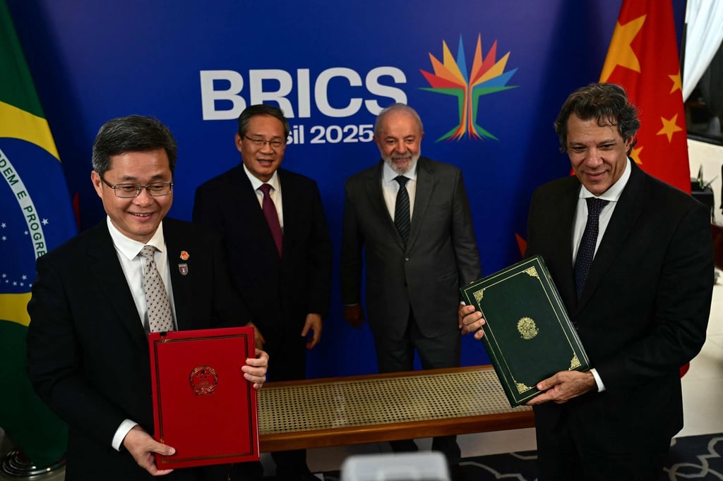 Li Qiang and Luiz Inácio Lula da Silva pose with Chinese Finance Minister Lan Foan (far left) and Brazil’s Economy Minister Fernando Haddad after the signing of a bilateral agreement, in Rio de Janeiro on Friday. Photo: AFP Li Qiang and Luiz Inácio Lula da Silva pose with Chinese Finance Minister Lan Foan (far left) and Brazil’s Economy Minister Fernando Haddad after the signing of a bilateral agreement, in Rio de Janeiro on Friday. Photo: AFP