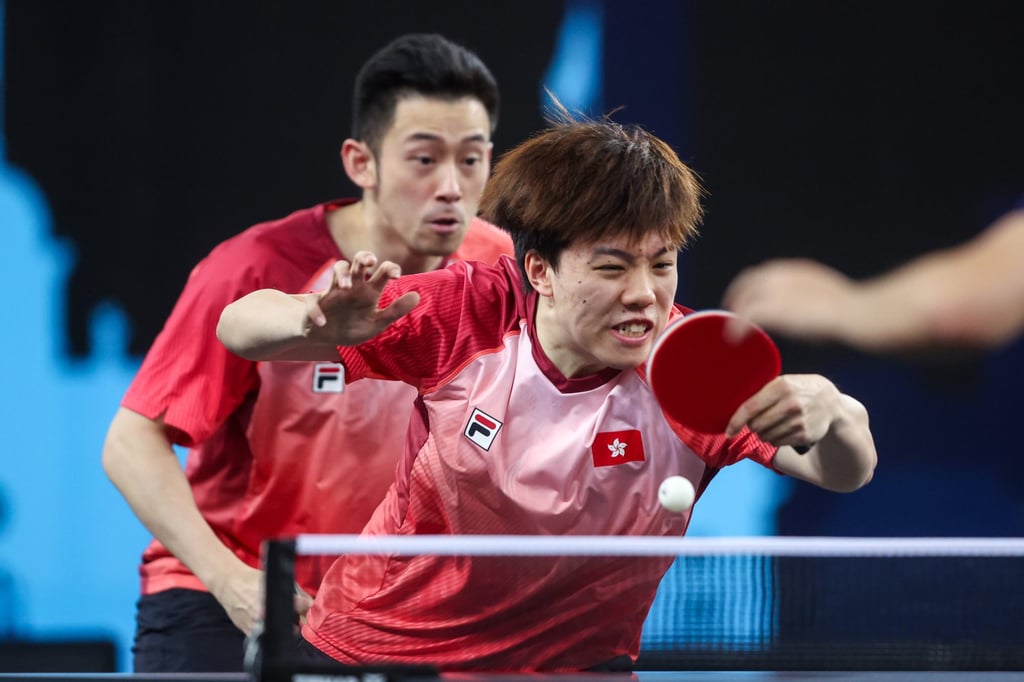 Baldwin Chan (front) still has an opportunity to make it into the second round, but doubles partner Wong Chun-ting is already out. Photo: Xinhua