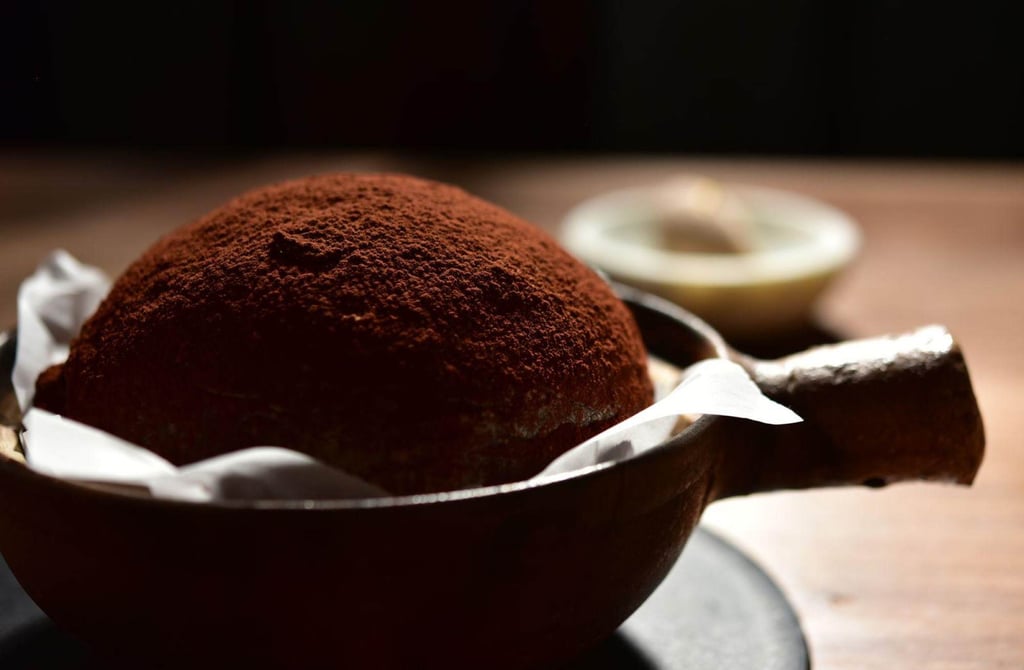 Otera creates a satiny sourdough infused with dark chocolate and baked perfectly to achieve a nice crust. Photo: Handout Otera creates a satiny sourdough infused with dark chocolate and baked perfectly to achieve a nice crust. Photo: Handout
