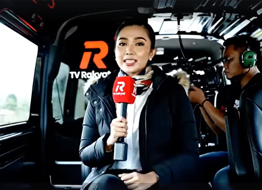 The artificial intelligence-generated “journalist” reports from her unreal broadcast van. Photo: Facebook/Nurul Afzarina Mokhtar The artificial intelligence-generated “journalist” reports from her unreal broadcast van. Photo: Facebook/Nurul Afzarina Mokhtar