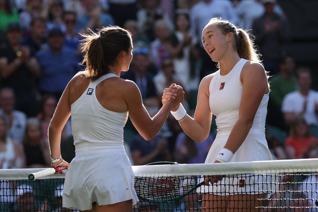 Russia’s Mirra Andreeva (right) shakes hands with the US' Emma Navarro after winning their women’s singles fourth round tennis match on the eighth day of the 2025 Wimbledon Championships at the All England Lawn Tennis and Croquet Club in Wimbledon, southwest London, on July 7. Photo: AFP