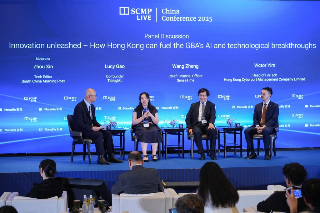 South China Morning Post technology editor Zhou Xin (left) moderates a panel discussion with TabbyML co-founder Lucy Gao, SenseTime chief financial officer Wang Zheng and Victor Yim, head of fintech at Cyberport, during the SCMP’s China Conference 2025 on Tuesday at the JW Marriott Hotel in Admiralty. Photo: Eugene Lee South China Morning Post technology editor Zhou Xin (left) moderates a panel discussion with TabbyML co-founder Lucy Gao, SenseTime chief financial officer Wang Zheng and Victor Yim, head of fintech at Cyberport, during the SCMP’s China Conference 2025 on Tuesday at the JW Marriott Hotel in Admiralty. Photo: Eugene Lee